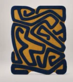 Storm Over Sahara Hand Tufted Rug, abstract area rug in navy blue and mustard yellow with raised maze pattern and scalloped irregular border — luxury wool rug for living room