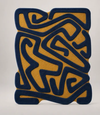 Storm Over Sahara Hand Tufted Rug, abstract area rug in navy blue and mustard yellow with raised maze pattern and scalloped irregular border — luxury wool rug for living room