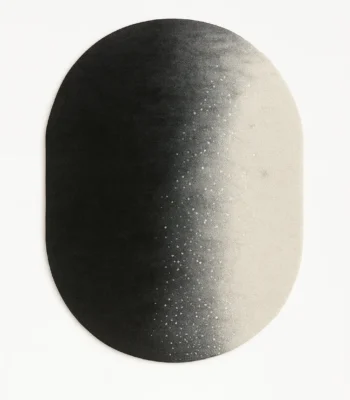 Ombré Starfield black and ivory luxury rug with gradient ombré design and celestial speckled texture.