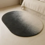 Ombre Starfield hand tufted rug with a black-to-ivory gradient and subtle speckled starfield texture.